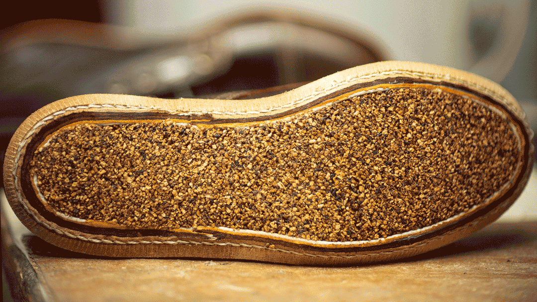 animation zooming in on cork filling in bottom of boot