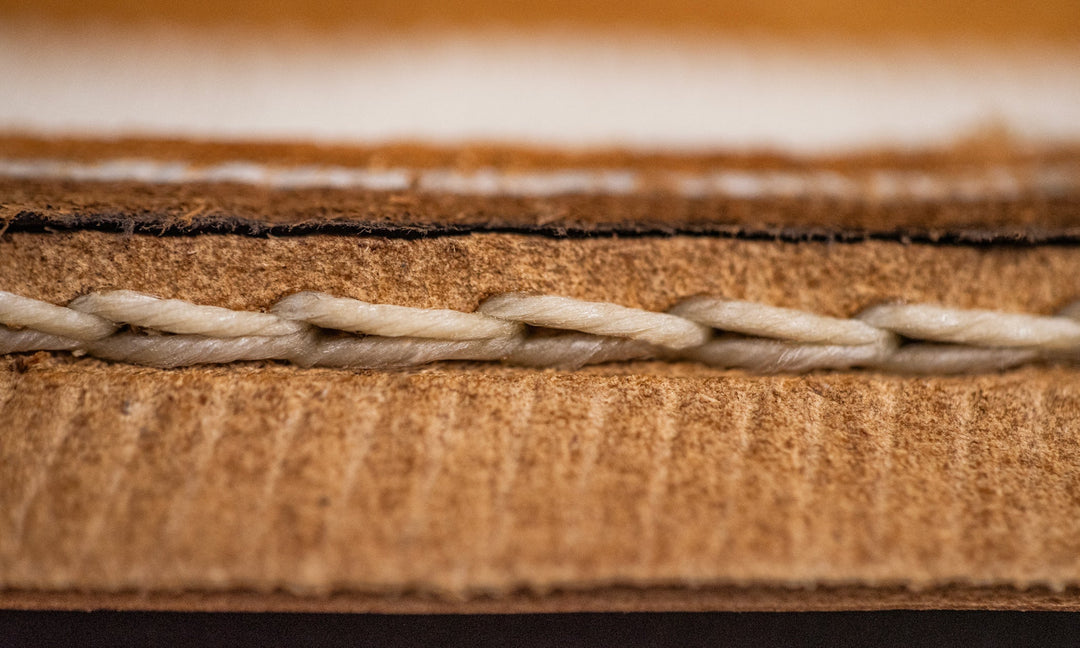 close-up macro shot of stitching on welt underside