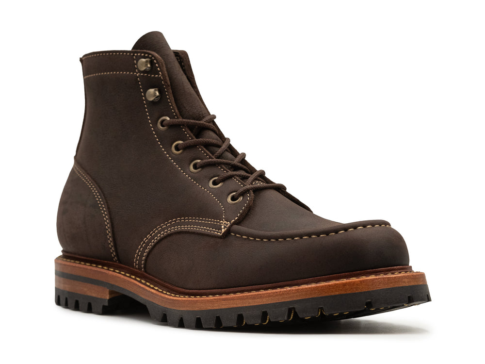 three-quarter view of brown textured kudu leather boot on white background