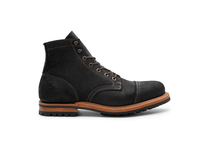 black leather boot on a white background rotating 360° view