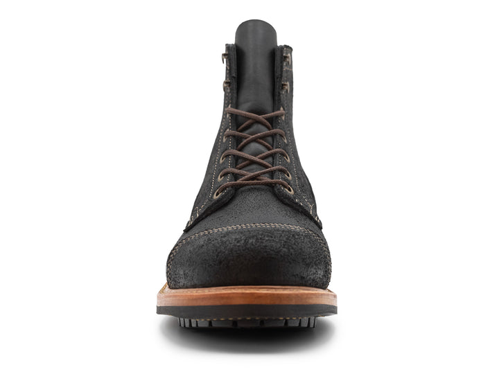 black leather boot on a white background front view