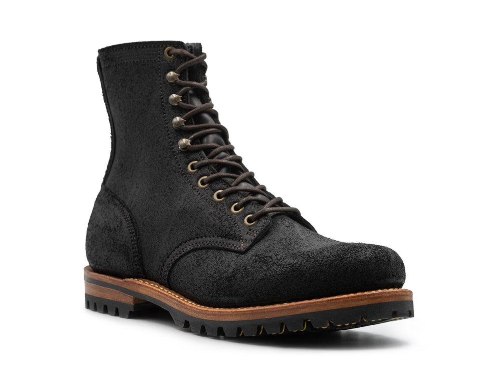 black rough out leather boot on a white background 3QTR view