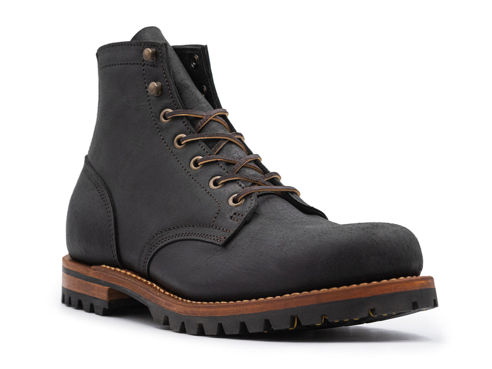 black leather boot on a white background 3QTR view