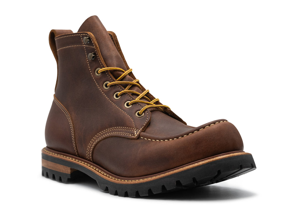 brown leather moc toe boot on a white background 3QTR view