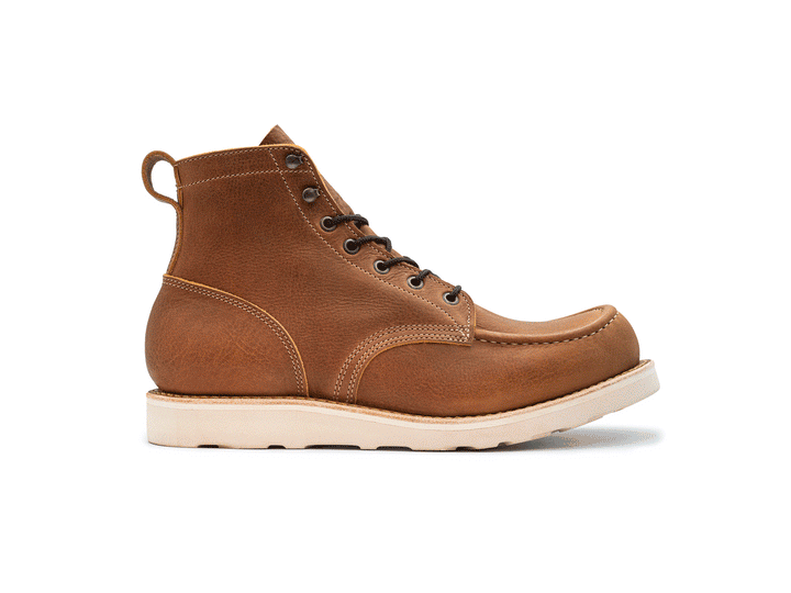 360° rotating animation of light brown leather moc toe boot on white background