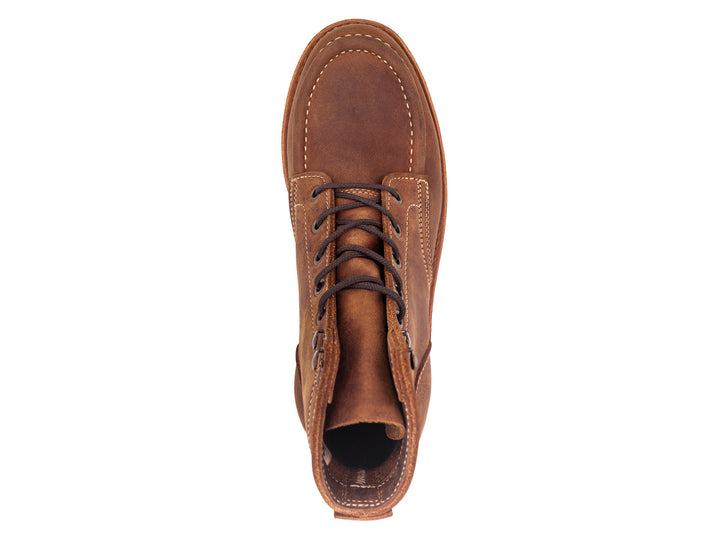 topdown view of brown leather moc toe boot on white background