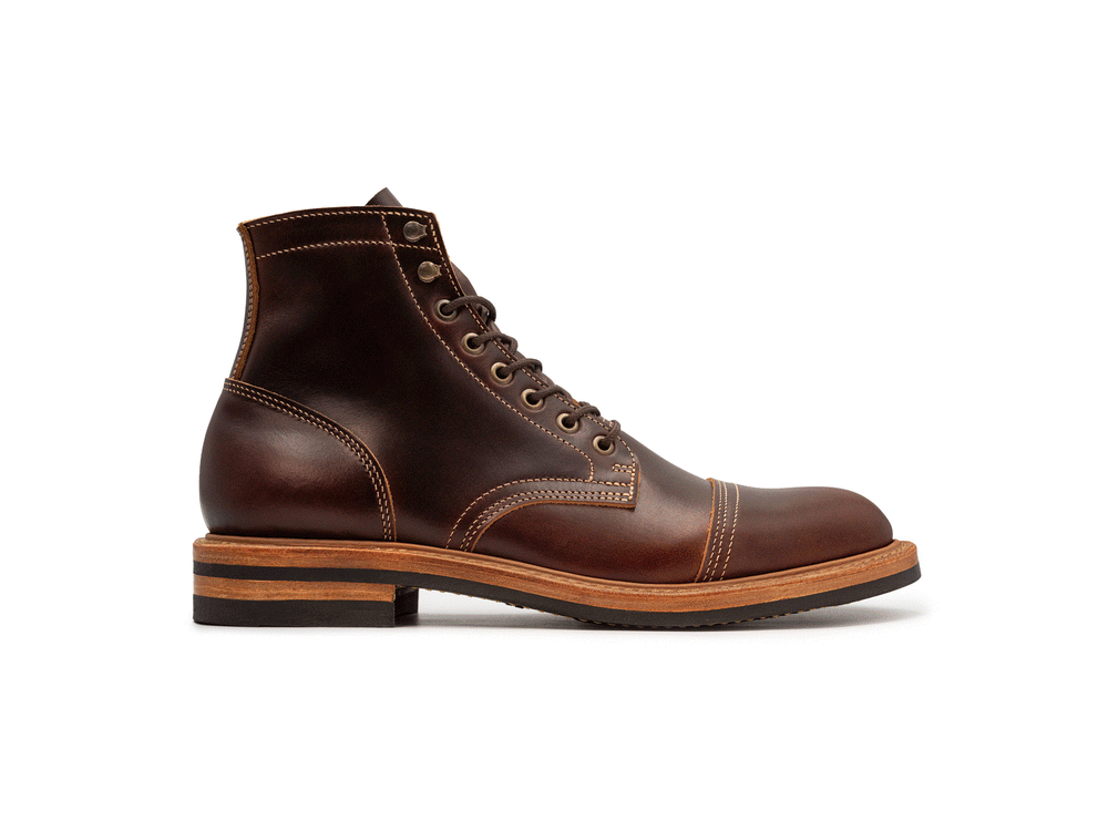 brown leather boot rotating on white background 