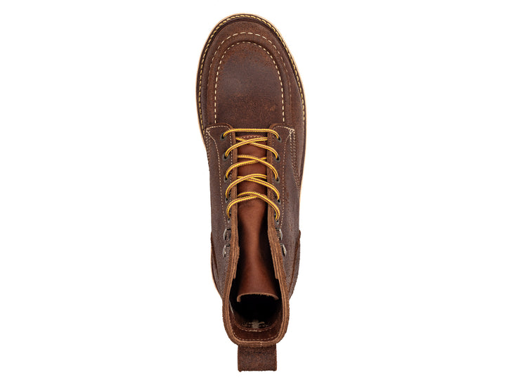 topdown view of brown oiled rough out leather moc toe boot on white background