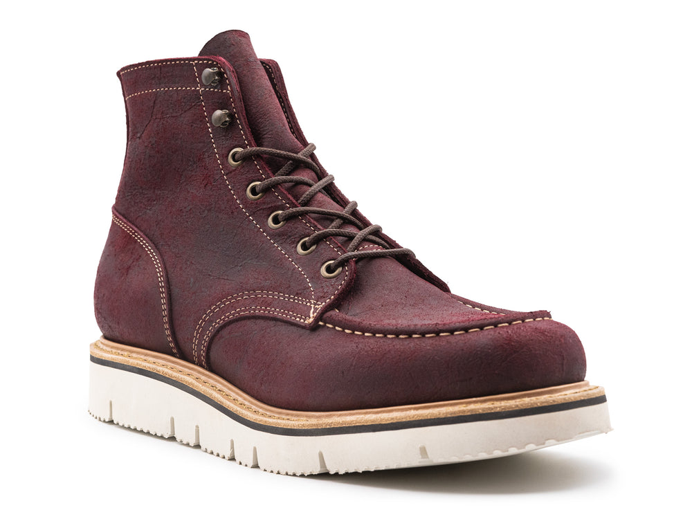 3qtr view of burgundy rambler leather moc toe boot on white background