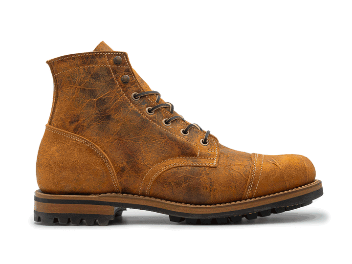 animation showing variety of textures on coach rambler boots in side view