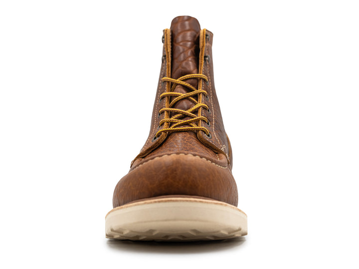 front view of cognac shrunken bison moc toe boot on white background