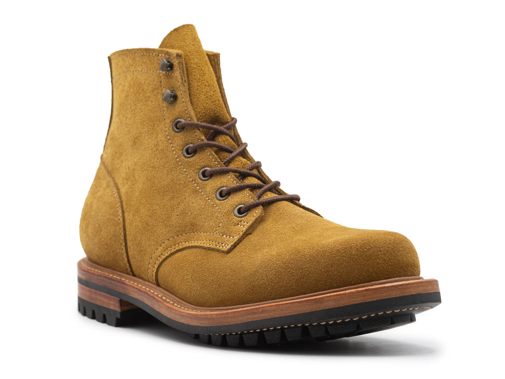 tan leather boot on a white background 3QTR view