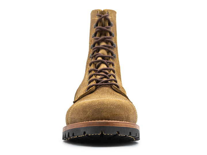 front view of coyote oiled rough out leather boot on white background
