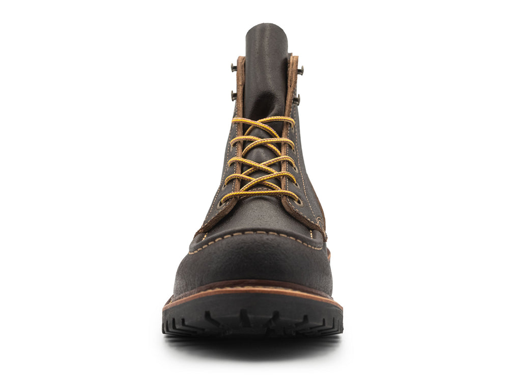 dark brown leather boot on a white background front view