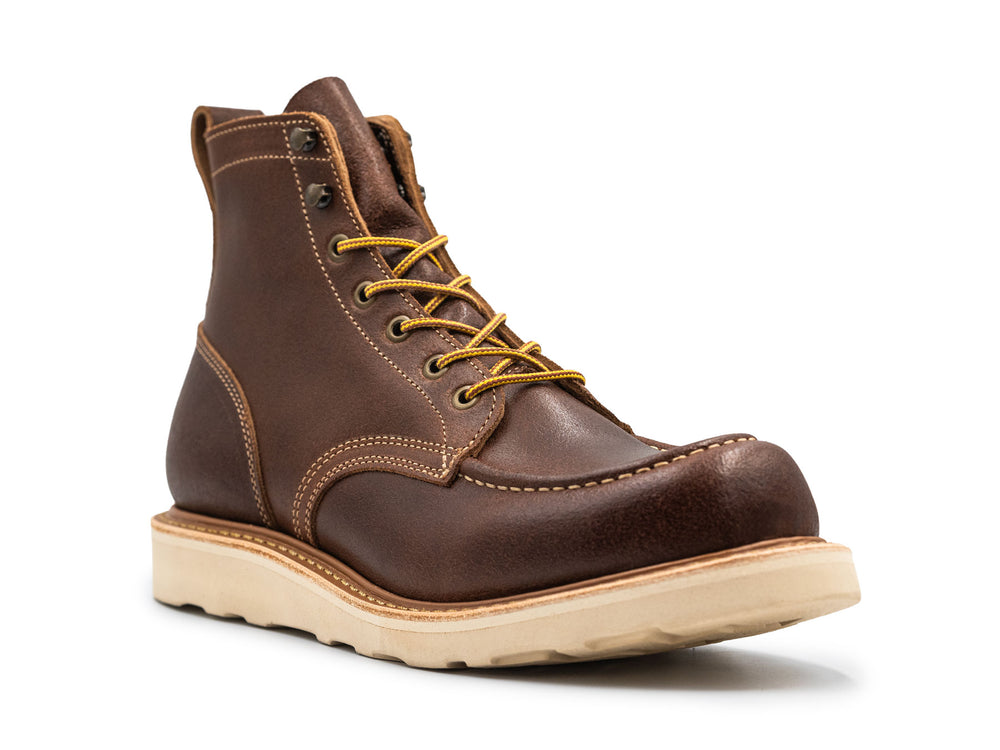 Brown leather moc toe boot with yellow laces on a white background 3QTR view