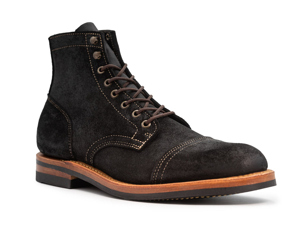 3qtr view of black leather boot on white background