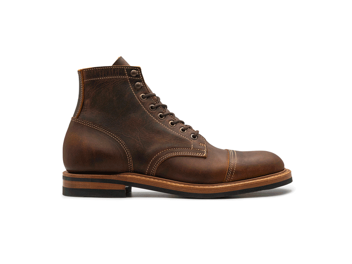 rich brown leather boot on a white background rotating 360° view