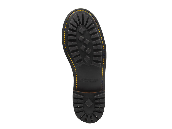 bottom view of truman commando sole showing tread, golden stitching and heel nails