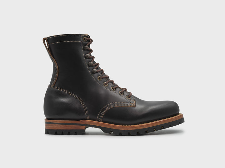 rotating 360° view of tall black leather boot on white background