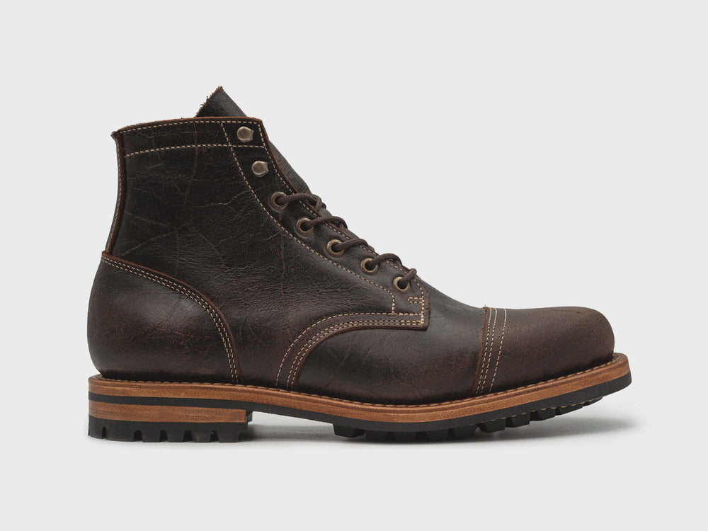 animation flipping through different colored textured leather boots on white background