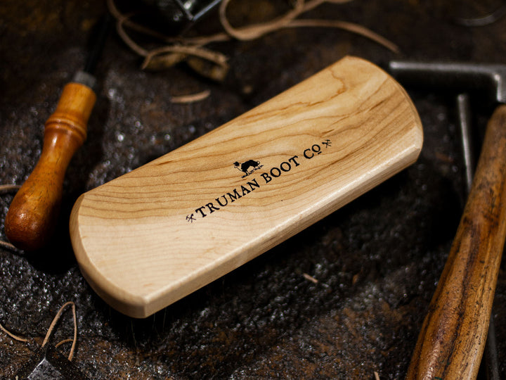 Horsehair brush among boot making tools